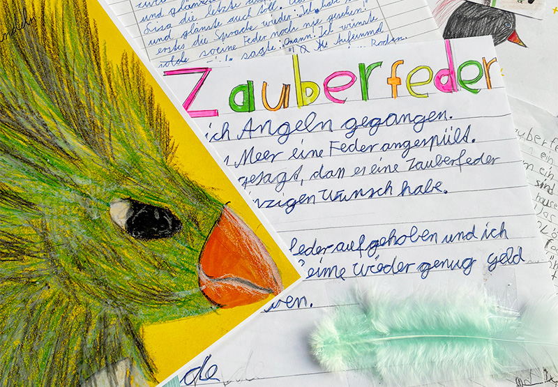Von einem Kind angefretigte Zeichnung eines Vogels und Text dazu